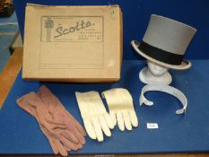 A boxed Scott's of London gentleman's Top Hat with gloves and collar.