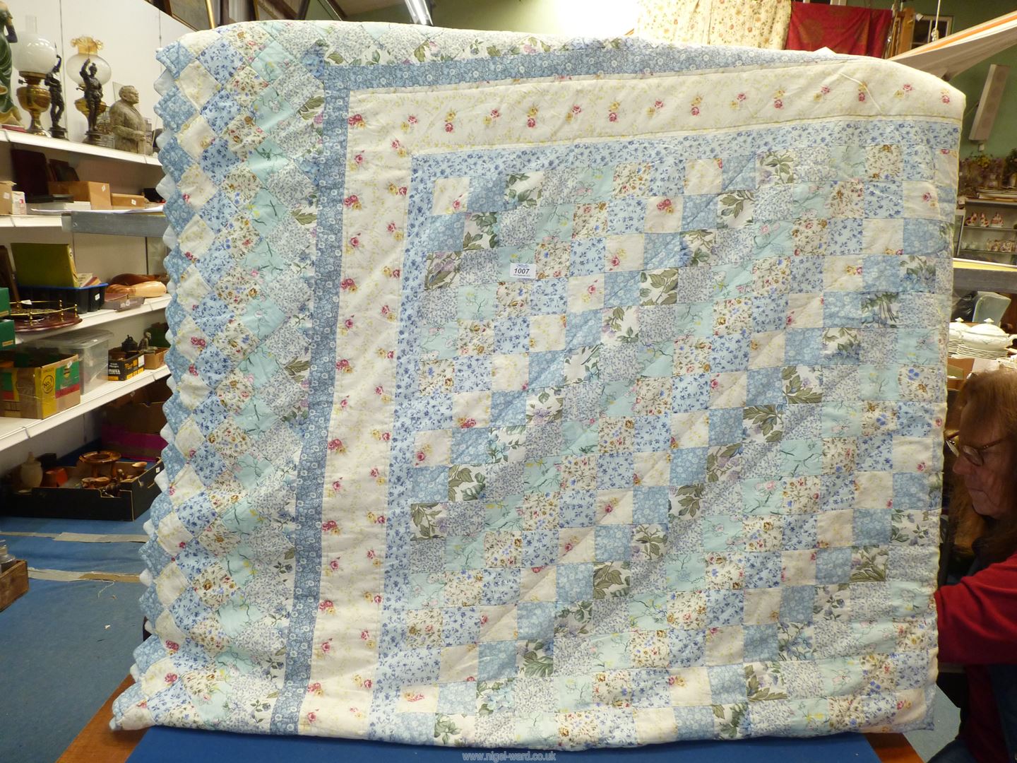 A vintage multi coloured blues hand-crafted cotton Quilt, 8' 6" x 8' 6".