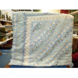 A vintage multi coloured blues hand-crafted cotton Quilt, 8' 6" x 8' 6".