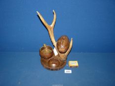 An unusual early 20th Century Bavarian style smokers companion mounted with deer antler having