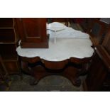 An elegant Marble topped Console Table having substantial cabriole front legs terminating in well