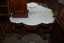 An elegant Marble topped Console Table having substantial cabriole front legs terminating in well