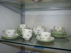 A Shelley 'Late Foley' part tea set to include six cups and eleven saucers, eleven tea plates,