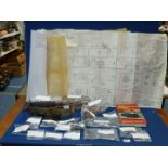 A 'TICH' steam Locomotive assembly kit, a quantity of engineers model plans and a book.