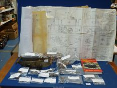 A 'TICH' steam Locomotive assembly kit, a quantity of engineers model plans and a book.