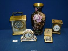Two quartz carriage clocks, a Royal Crown Derby miniature mantle clock,