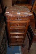 An unusual Continental mixed hardwood Bedside Cabinet having a shaped veined brown marble top,