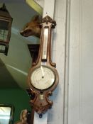 A Walnut 'Callaghan & Co' banjo, Aneroid Barometer, circa 1890, having shield plaque to base 'L.P.T.
