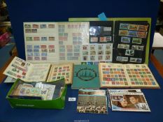 A quantity of stamp albums with contents and loose stamps, stamp sets, First Day covers, etc.