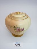 A lobed Royal Worcester blush jar and cover, painted with flowers and foliage, pattern no: 1314,