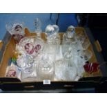 A quantity of glass decanters, vases with red panels, paperweights, wine glasses, etc.