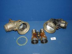 A pair of leather covered Binoculars and two vintage Lamps with small faceted green glass inserts
