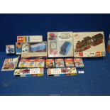 A quantity of boxed Lego trainset including locomotive, rolling stock, components, etc.