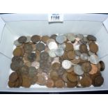 A box of copper and silver coins, pre-decimal and decimal.