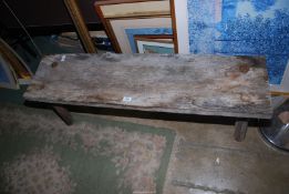 An Oak Pig Bench, 47 1/2'' long, weathered condition.