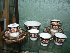 A set of six Wedgwood Imari pattern cups, saucers, tea plates and bowl, printed urn mark circa 1910.
