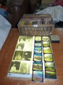 A quantity of boxed sets of glass slides including The Millers Donkey, Old folks at Home,