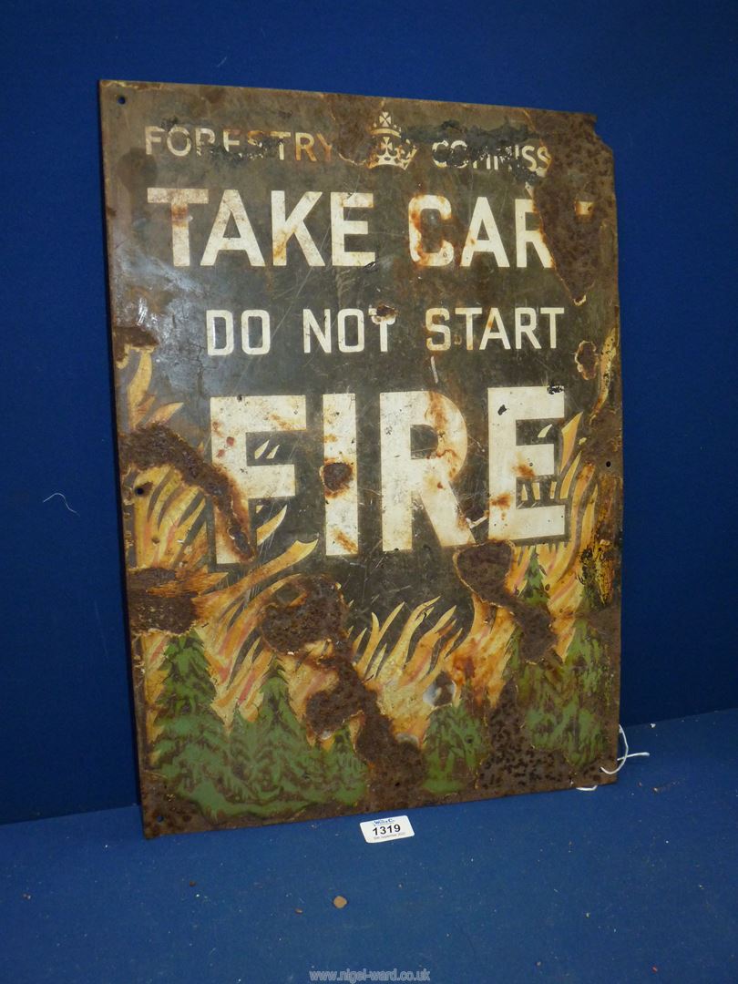 A metal Forestry Commission 'Take care do not start a fire' sign, distressed, 15" wide x 21" high.