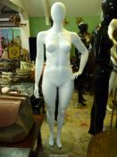 A white shop mannequin in a matt finish, 73" tall. N.B.