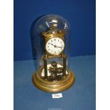 A glass domed anniversary Clock, 11 1/2" tall.