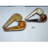 Two antique meerschaum Pipes with original cases - one being a 'HP' with hallmarked silver mounts