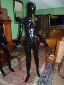 A black gloss full body shop mannequin, 73" tall. N.B.