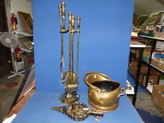 A brass fire companion, brass coal bucket and bellows.