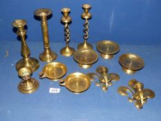 A quantity of candlesticks including pair of barley twist, column Candlesticks, plus pricket stands,