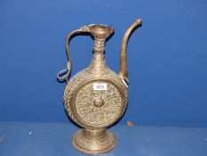 An elaborately engraved Persian ewer, (repair to spout), 15" tall.