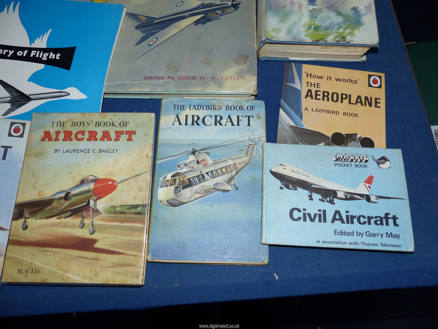 A box of Aviation books to include; W.E. Johns, Some Milestones of Aviation, Lady Bird books, etc. - Image 3 of 7