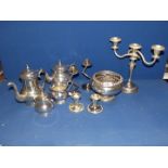 A box of silver plate to include tea and coffee service, candelabra, rose bowl, candlesticks, etc.