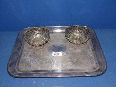 A Mappin & Webb plated tray with engine turned detail, plus a pair of plated bonbon dishes.