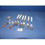 A small quantity of silver including a set of six forks with Sheffield 1927 silver band,