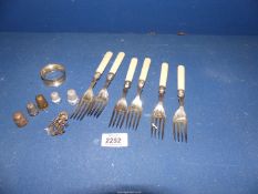 A small quantity of silver including a set of six forks with Sheffield 1927 silver band,