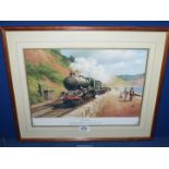 A framed railway Print by Don Breckon of King George V steam train on the sea wall.