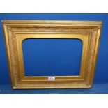 A Victorian wood and gesso picture frame.