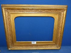 A Victorian wood and gesso picture frame.