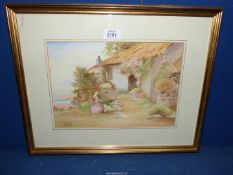 A framed and mounted Watercolour depicting a young lady feeding a lamb outside thatched cottage,