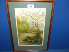 A framed and mounted Watercolour of Westonbirt Arboretum, signed lower right L. Wiggin.