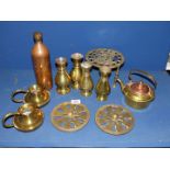 A quantity of brass including trivet, two pairs of vases, pair of jugs, two brass vents,