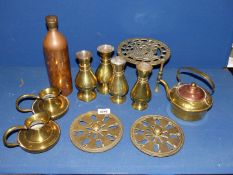 A quantity of brass including trivet, two pairs of vases, pair of jugs, two brass vents,