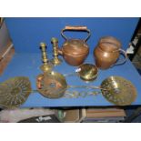 A box of brass candlesticks and trivets, copper jug and kettle, chestnut roaster, etc.