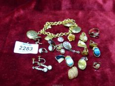 A small box of mixed costume jewellery including clip-on earrings, bracelet, ring, etc.