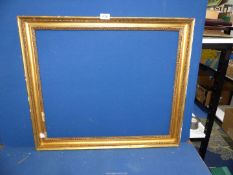 An antique gilt picture frame, 56 1/2'' x 45'', a/f.