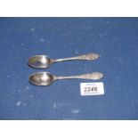 Two silver Teaspoons with bead and scroll handles, London 1902, 30 grams.