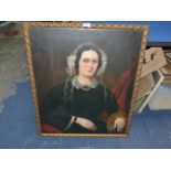 A mid 19th century Victorian Oil painting of a sitting matron with lace hat and cuffs.