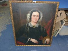 A mid 19th century Victorian Oil painting of a sitting matron with lace hat and cuffs.