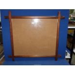 A large chamfered and cross cornered picture Frame.