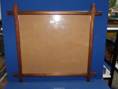 A large chamfered and cross cornered picture Frame.