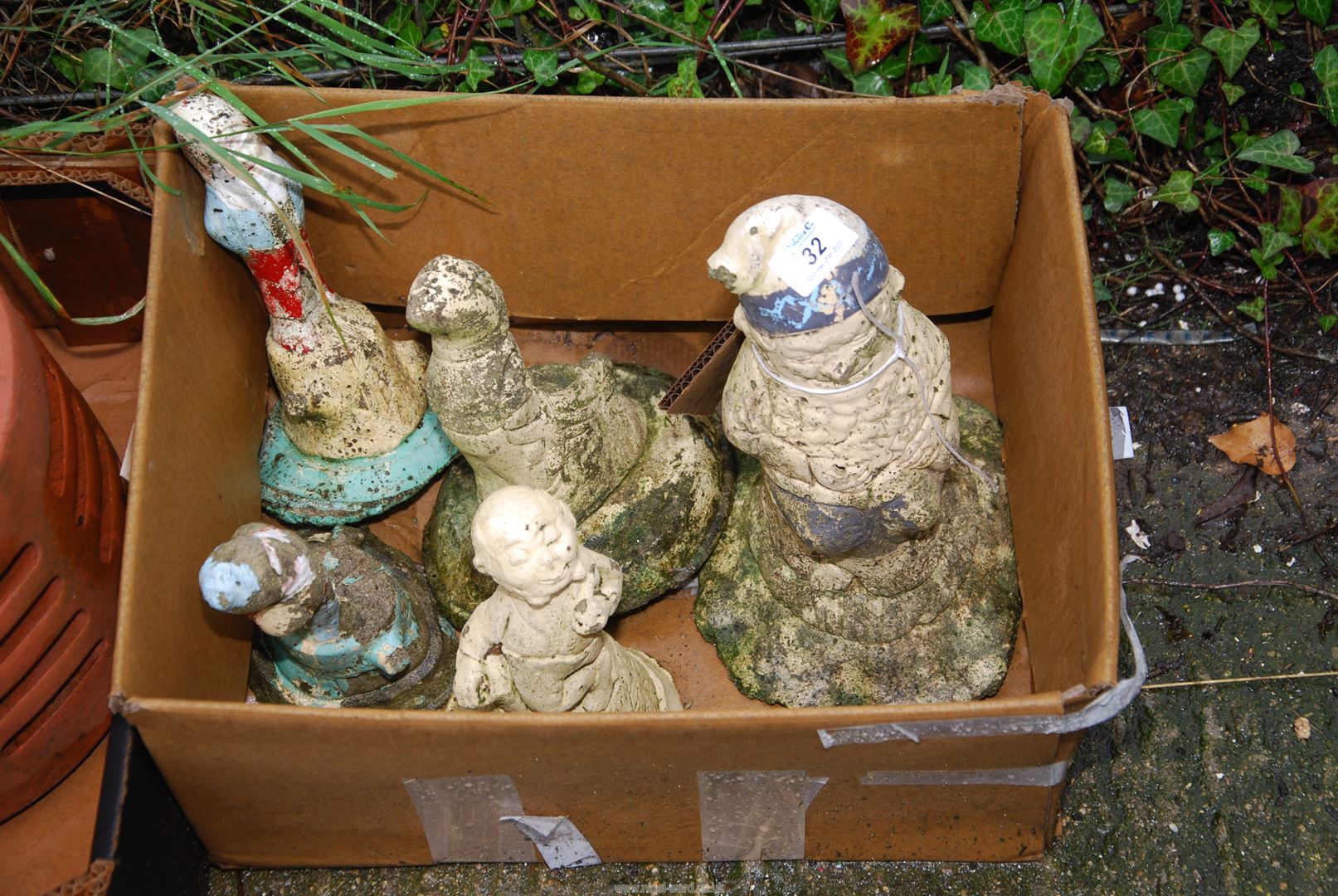 Garden ornaments including gnomes.